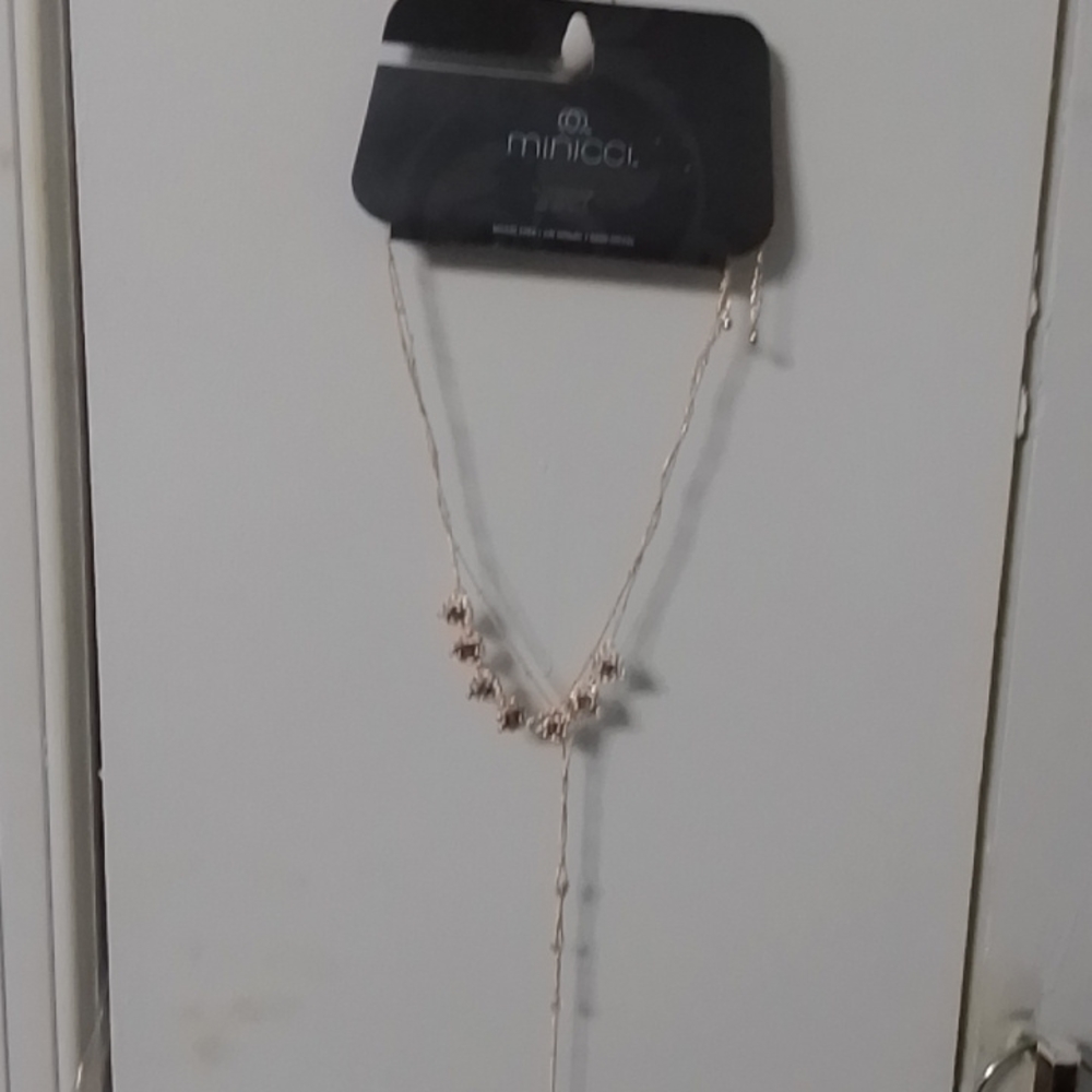 Minicci Costume necklace, rose gold tone